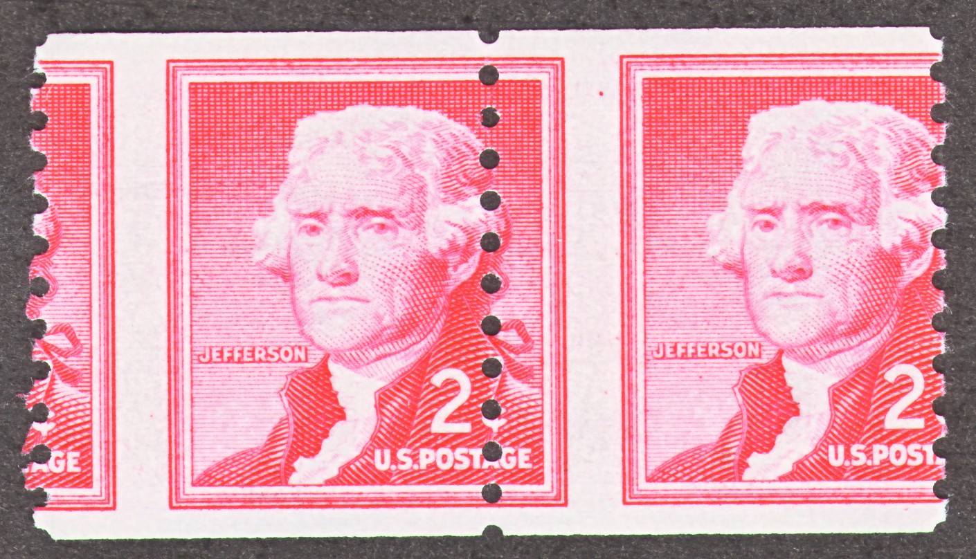 stamp coil pair with dramatic misperf showing right through the design